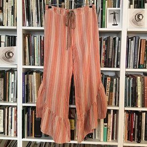 "Pajama-style Pants with Drawstring & Ruffle Hem.